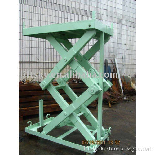 Stationary scissor lift